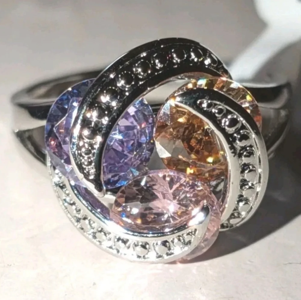 Sparkling Zirconia With Pink,yellow, and Purple Rotating Gemstone Design Sz 8